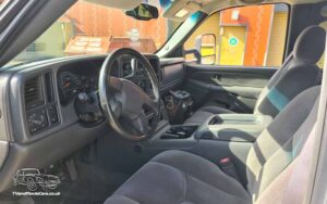 TV Film Movie Action Vehicle Scotland USA Cars GMC Sierra 2500HD Interior Front OS.jpg