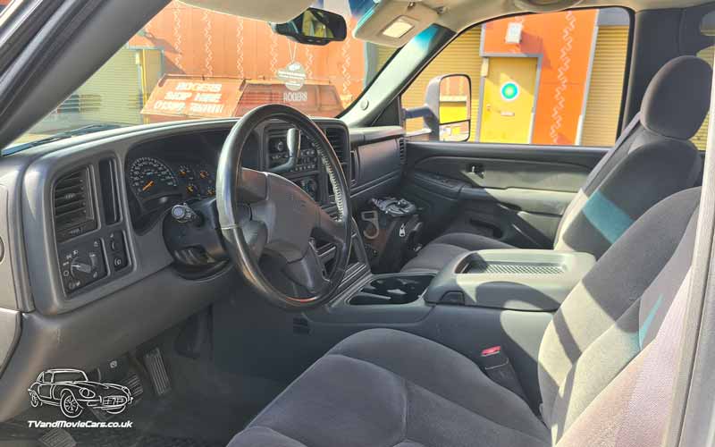 TV Film Movie Action Vehicle Scotland USA Cars GMC Sierra 2500HD Interior Front OS.jpg